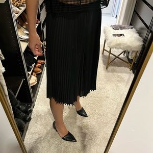 BCBG pleated mid-length, knee-length skirt